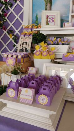 purple and yellow dessert table for a birthday party