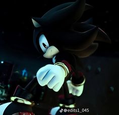 sonic the hedgehog is holding his arm out and pointing at something in front of him