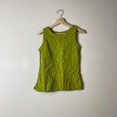 90s vintage green cotton mirrored tank top Max made in india 100% cotton (label size s) best for modern small, refer to measurements Excellent Vintage Condition  MEASUREMENTS IN INCHES (laid flat + unstretched double where needed) : Pit to pit: 15.5 Waist: 16 Length: 23 All sales final. Each vintage piece has been preloved. Minor fading + wear is expected & often adds to the character. All items are cleaned & from a smoke & pet free building. We hope you appreciate this find as much as we do. Fitted Green Vest Top, Green Cotton Tank Top, Green Summer Tank Vest, Green Tank Vest For Summer, Green Fitted Summer Vest, Green Cotton Vest Top, Green Sleeveless Top Vest For Summer, Green Vest Top For Spring, Fitted Green Cotton Tank Top