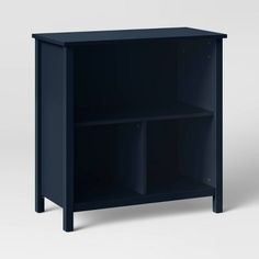 a black shelf with two shelves on one side and an open drawer on the other