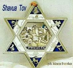 an ornament with the name shavua tov written in hebrew on it