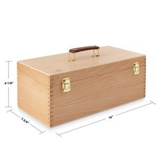 a wooden box with brass handles is shown on a white background and has measurements for the width