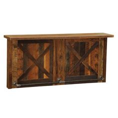 a wooden shelf with two metal bars attached to the top and one is made out of wood