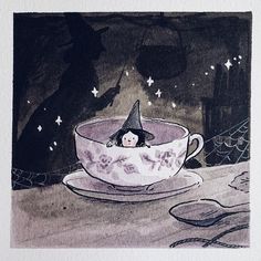 a drawing of a tea cup with a witches hat on it