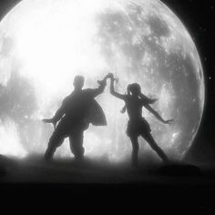 two people are dancing in front of a giant moon with their arms extended and one person is holding the other's hand