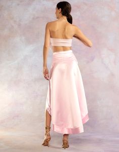 Light pink satin high low skirt. Hi-low hem Side invisible zipper High waisted Fabric content: 100% polyester Care instructions: dry clean only Fit: model is 5'9" and wears a size 2. Size 2 measurements: Length in front: 20" Full length: 41'' Complete the look: Organza Flower Bandeau Light Pink Skirt, Organza Flowers, High Low Skirt, Satin Color, Satin Skirt, Pink Skirt, Silk Skirt, Cynthia Rowley, Pink Satin