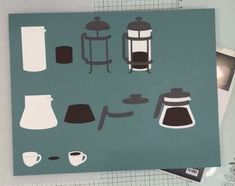 an image of coffee related items on a table top with scissors and tape around it