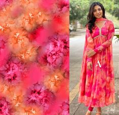 a woman standing next to a pink and orange floral print dress