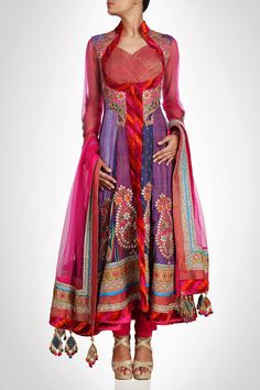 This high neck long anarkali suit is in purple color silk. Each kali of this anarkali suit is of different designer silk fabric. Sleeves and dupatta of this anarkali suit is in Pink color which gives this anarkali suit a royal look. Hemline of this suit is designed with lace work. Multicolored Anarkali, Hindi Fashion, Futuristic Designs, Long Anarkali, Anarkali Salwar, Curated Outfit, Top Indian, Designer Anarkali, Desi Style