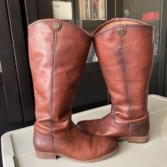 Previously owned Fry boots in good condition. A small scuff on the left boot is highlighted in the photo.
The boot length is 15 inches from the heel. 
The heel is 1 inch Fry Boots, Women's Boots, 1 Inch, Womens Boots, Thing 1, Boots, Heels