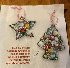 an ornament is hanging on a piece of paper with the words hot glue tinsel and mini christmas ornaments in solid backed aluminum cutters to create sparky ornaments