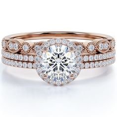 a rose gold engagement ring set with an oval center stone surrounded by round brilliant cut diamonds