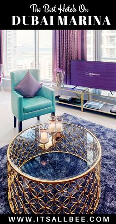 the best hotels on dubai marina are in this hotel room with purple curtains and blue chairs