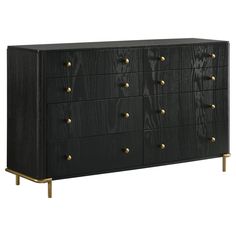 a black dresser with gold handles and drawers