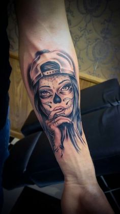 a person with a tattoo on their arm