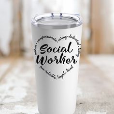 a white tumbler cup with the words social worker written in black ink on it