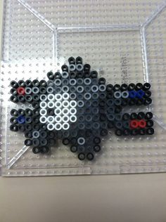 an image of a black and white animal made out of legos