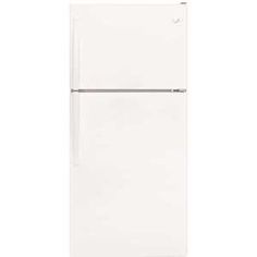 a white refrigerator freezer sitting on top of a counter