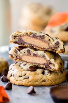 three chocolate chip cookies stacked on top of each other