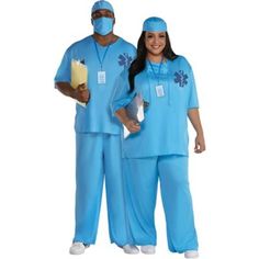 two people dressed in blue scrubs and masks, one is holding a clipboard