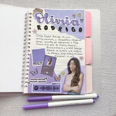 a spiral notebook with an image of a woman on it