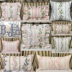 pillows with monogrammed designs on them in different colors