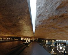 the inside of a building with sculptures on display