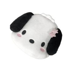 a white and black stuffed animal with a pink star on it's head,