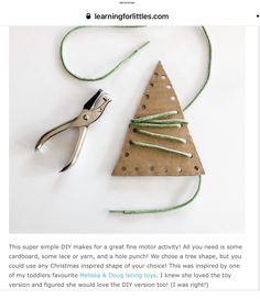 a christmas tree ornament made out of brown paper with green string and scissors