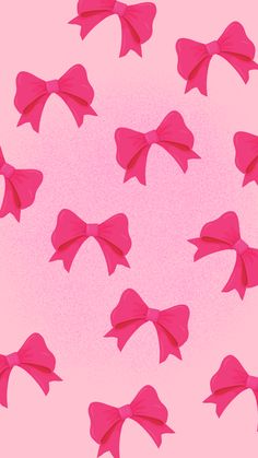 many pink bows are arranged in the shape of a circle