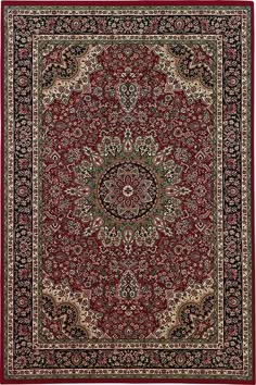 a red and black rug with an ornate design on the center, surrounded by smaller floral designs