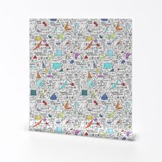 a white canvas with colorful drawings on the front and back of it's cover