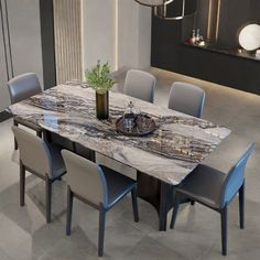 a dining room table with chairs around it