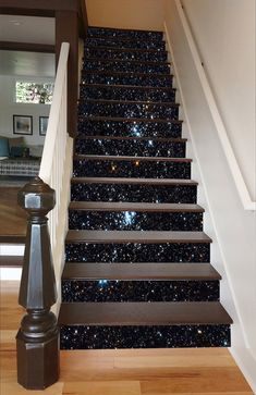 the stairs are decorated with black and white stars