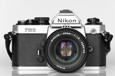 the nikon f2 camera is shown with its lens pointed at it's side