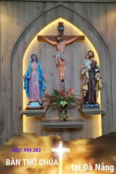 the crucifix is displayed in front of a wooden wall