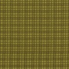 a green and brown plaid fabric with small squares