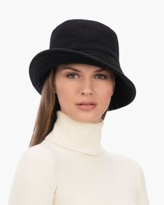 A cozy, lightweight women's bucket hat of spun wool with trapunto stitched brim rolls up easily into a coat pocket or a tote bag. Eric says, "It's definitely a bucket hat season where the attitude is a bit more casual than a fedora." What makes this women's bucket hat most desirable is that the crown is spun and then blocked to achieve the shape; The crown has no visible seams so it doesn't feel thick, while providing great insulation and protection from the elements. Brim span: 2.75"(7cm) Fully Classic Solid Cloche Hat For Fall, Classic Solid Color Cloche Hat For Fall, Classic Fall Cloche Hat, Casual Wool Cloche Hat With Short Brim, Casual Wool Bucket Hat With Curved Brim, Casual Wool Brimmed Cloche Hat, Winter Travel Hats With Curved Brim, Trendy Brimmed Bucket Hat For Fall, Classic Winter Bucket Hat