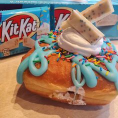 a close up of a doughnut with sprinkles