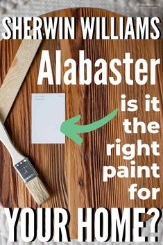 a wooden table with a brush and paper on it that says, shewin williams's abaaster is the right paint for your home?