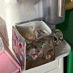 a close up of a toaster on a counter