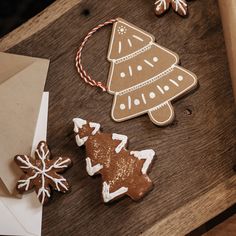 some cookies and decorations on a wooden table