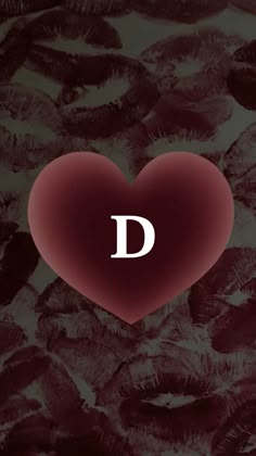 a red heart with the letter d on it