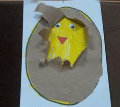 a piece of paper that has been cut out to look like a chicken in a hole