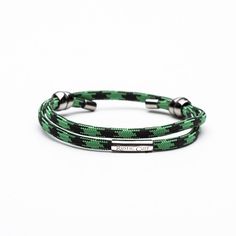 A new addition to the RC Men's Line - this paracord bracelet will definitely be a new favorite! The durable cord material will ensure long lasting wear along with the sterling silver and black titaniu Mens Sliders, Scarf Rings, Paracord Projects, Paracord Bracelet, Paracord Bracelets, Fit Men, Green Camo, Silver Accents, Bandanas