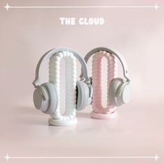 two headphones sitting next to each other on top of a pink background with the words the cloud above them