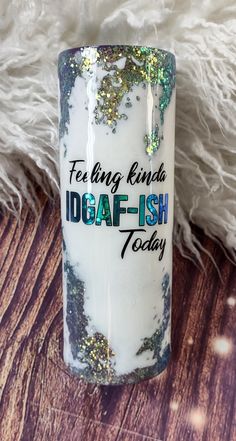 a coffee mug with the words feeling kinda doafish today on it sitting on a wooden table