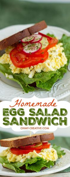 an egg salad sandwich with lettuce and tomatoes on it, sitting on a white plate