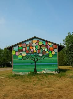 a tree painted on the side of a building