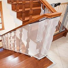 an overhead view of a stair case with a curtain over it